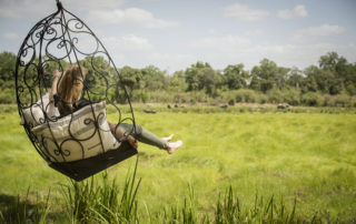 Little Governors' Camp - Swing chair overlooking the Marsh
